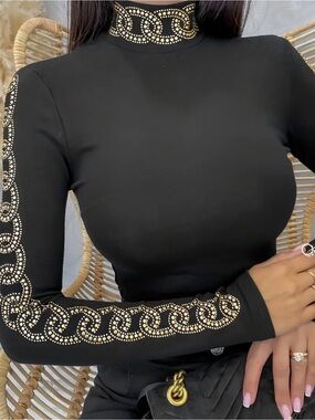 chic Black Long Sleeve Turtleneck Top with Gold Stud Chain Detail